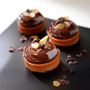 mini Tartelettes de Vanille, Cacahuète et Chocolat depuis recettemoderne